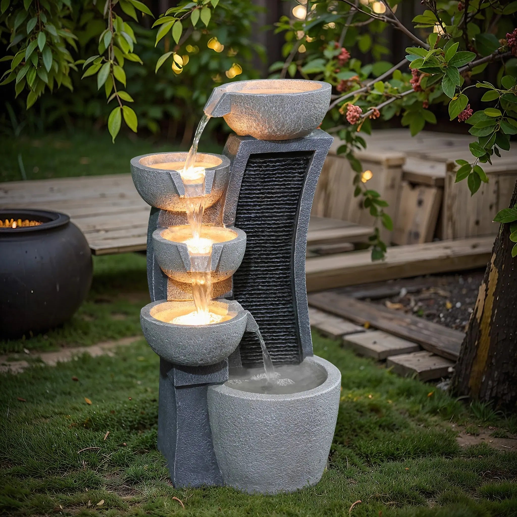 Modern cascading resin outdoor water fountain with LED lights - LuxenHome