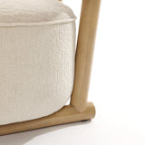Close-up of the LuxenHome Rio upholstered cream accent chair, showcasing its light wooden frame and minimalist design with straight legs—ideal for a contemporary living space.