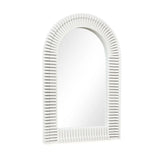 A white arched wall mirror with a ridged frame, featuring a pattern of evenly spaced indentations, perfect for stylish home decor.