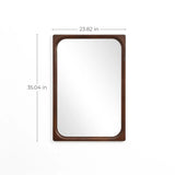 Elevate your home decor with this elegant wall mirror, featuring a rectangular rubberwood frame. It rests gracefully on a white wall, measuring 23.82 inches wide and 35.04 inches tall, adding timeless style to any space.