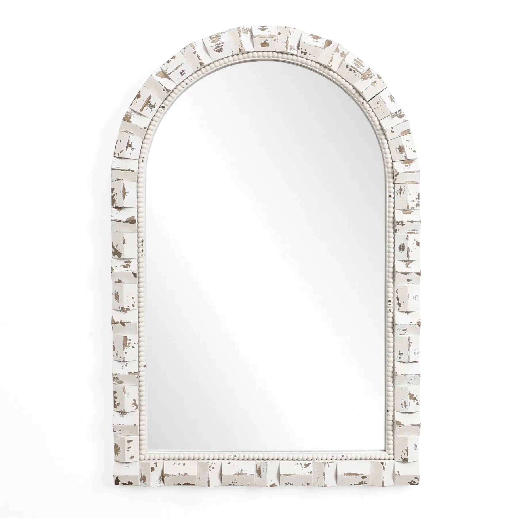 This vintage wall mirror, with its distressed white and brown frame, features a textured pattern and arched rectangular design, making it an elegant piece of home decoration that reflects a blank background.