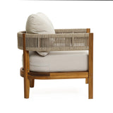 A Rope Sides Armchair crafted from acacia wood with weather-resistant beige cushions and a woven rope backrest, shown from the side against a white background.