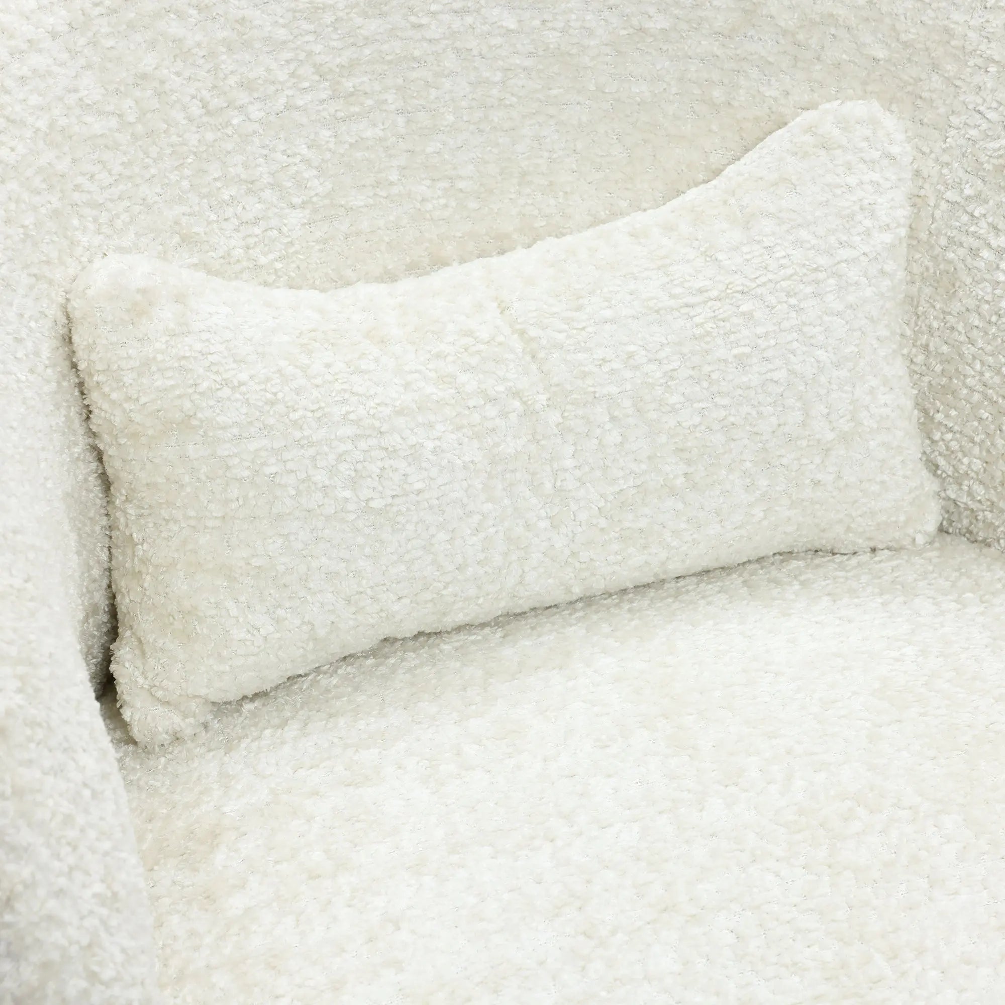 white-pillow-on-a-white-chair