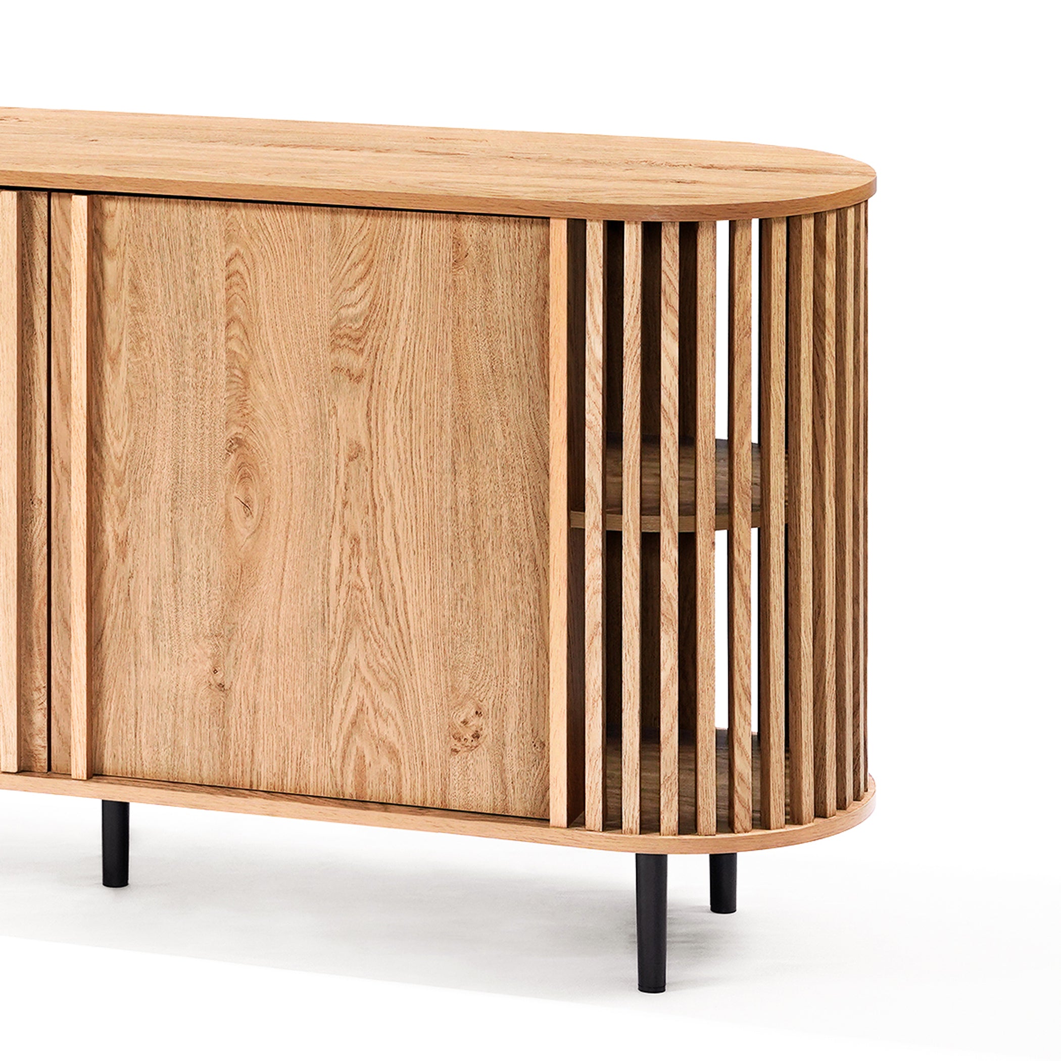 This mid-century modern buffet cabinet showcases vertical slat detailing on its sides. Crafted with an oval shape and standing on black metal legs, it boasts a decorative oak wood grain finish, making it a stylish addition to any space.