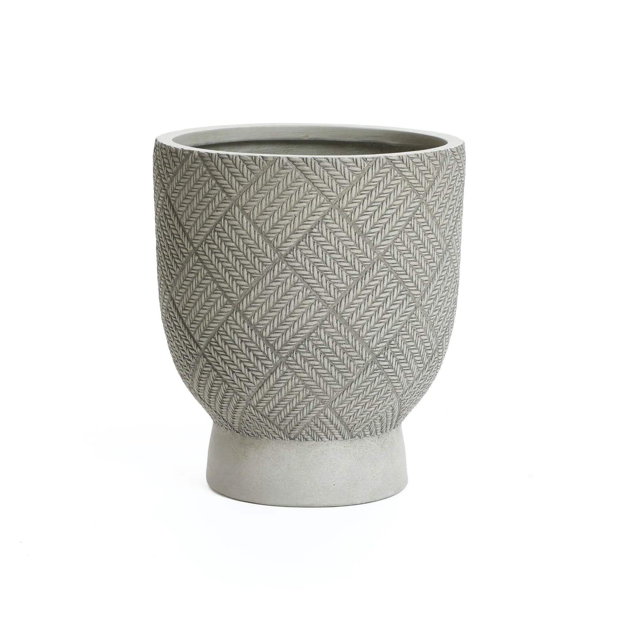 A textured, gray ceramic planter with a herringbone pattern and drainage hole sits elegantly against a white background.
