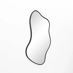 Modern minimalism shines through in this asymmetrical wall mirror, which boasts a sleek black frame against a crisp white background.