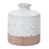 A small stoneware vase with a speckled white top and a rough, unglazed brown base, featuring a narrow neck and flat shoulder.