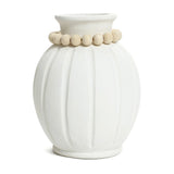 White ceramic vase with a minimalist design featuring vertical ribbed grooves and a decorative band of wooden beads around the top.