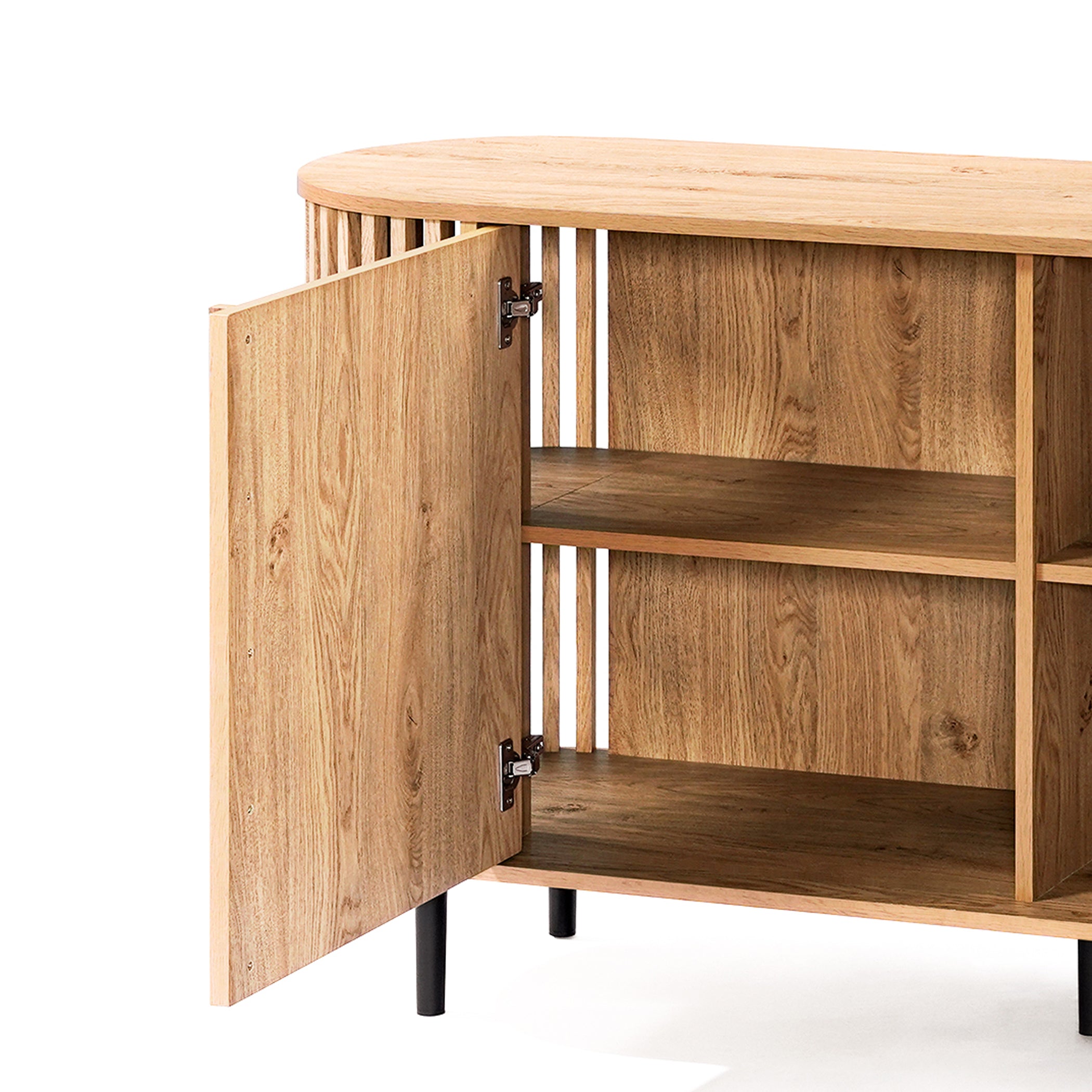 This decorative cabinet features an open door revealing spacious interior shelves. With its light oak wood grain finish and sleek black legs, it embodies a mid-century modern buffet cabinet style.