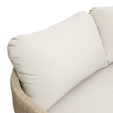 Close-up of a light beige cushioned seat with woven armrest, part of the Rope Sides Loveseat from an Outdoor Acacia Wood Coffee Table Set, showing the backrest and a portion of the seating area.