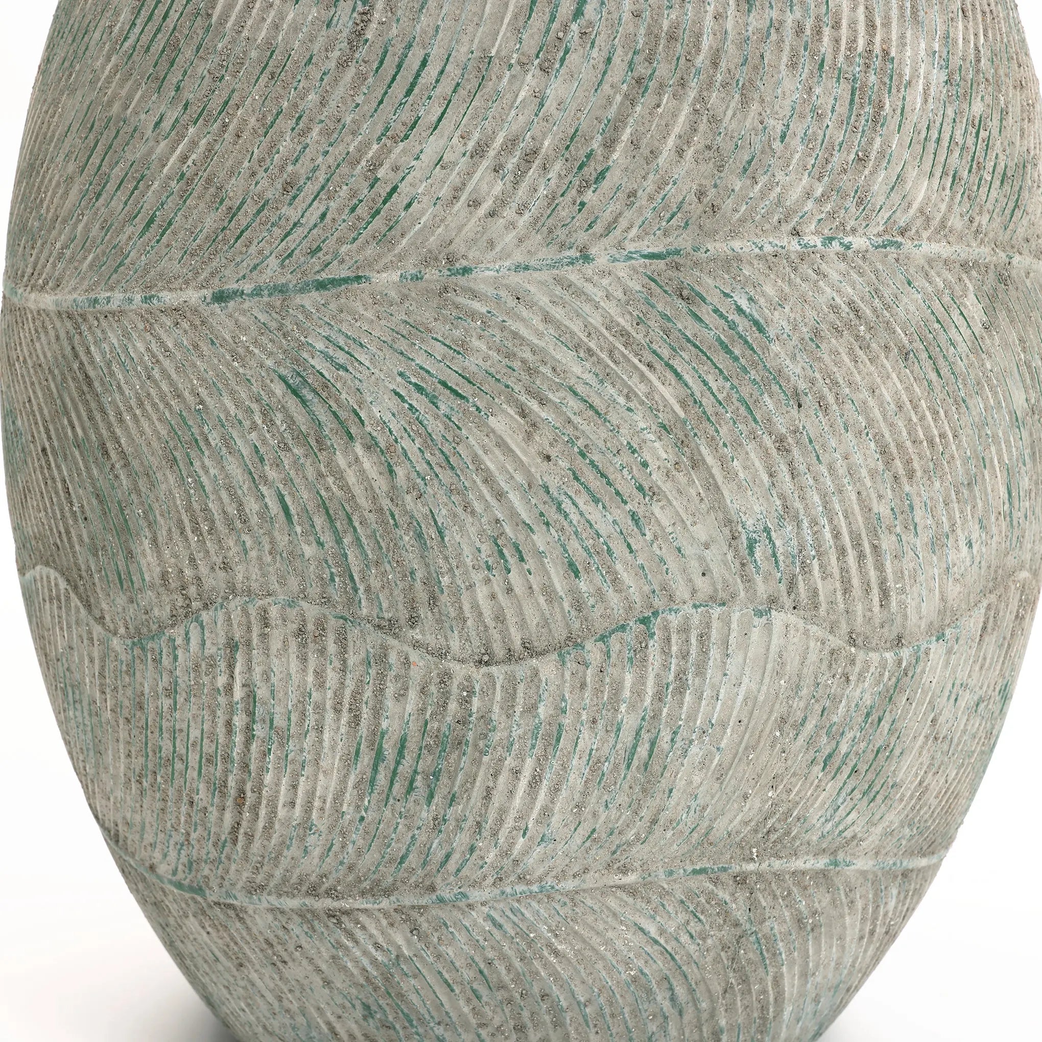 The close-up of the Rustic Multi-Color Cement 15.4-Inch Round Planter by LuxenHome reveals intricate wavy patterns in blue-green and gray hues, with fine grooves creating a flowing, rhythmic design that adds character to any space.