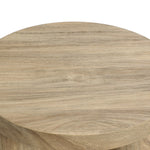 Close-up of a round side table showcasing natural wood grain and texture, designed with an oak finish for timeless elegance.