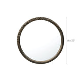 The LuxenHome Aged Wood Finish Crater Pattern Round Wall Mirror has a textured, brown crater frame with a dark wooden finish. Its 32-inch diameter and industrial-inspired design enhance the depth and character of any room.