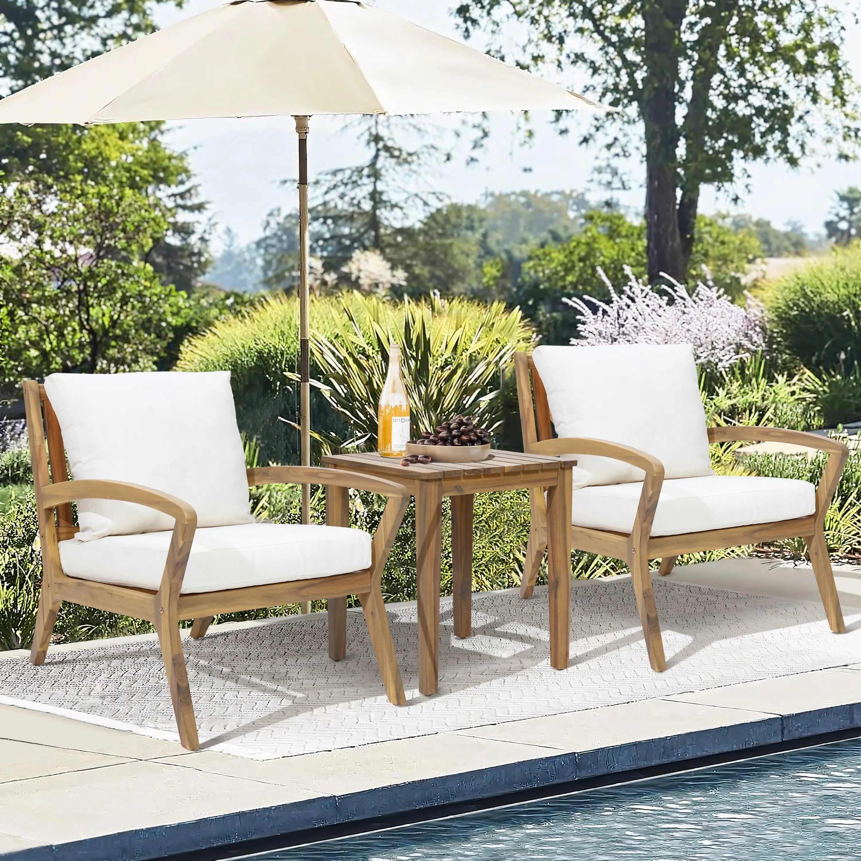 two-chairs-and-a-table-by-a-pool