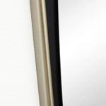 Close-up of a modern door, featuring a beige frame edge on the left and a sleek black frame edge on the right. The design adds a contemporary touch, perfect for complementing any space.