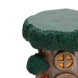 A close-up of a gnome tree house figurine featuring a green leafy roof, a round yellow window, and a textured brown tree trunk¡ªperfect for adding charm to your outdoor space decor.