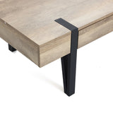 This vintage coffee table with black metal legs adds farmhouse charm to any living room.