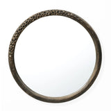 LuxenHomes Aged Wood Finish Crater Pattern Round Wall Mirror features an industrial-inspired design with a decorative dark brown frame. Its textured, porous upper details contrast beautifully against the plain white background.