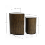 Two cylindrical wooden tables exude rustic charm. The larger table stands 24.21 inches tall with a top measuring 15.94 by 20.87 inches, while the smaller one is 19.29 inches tall with a top of 16.14 by 11.81 inches—perfect teardrop accent tables for any mid-century modern space.