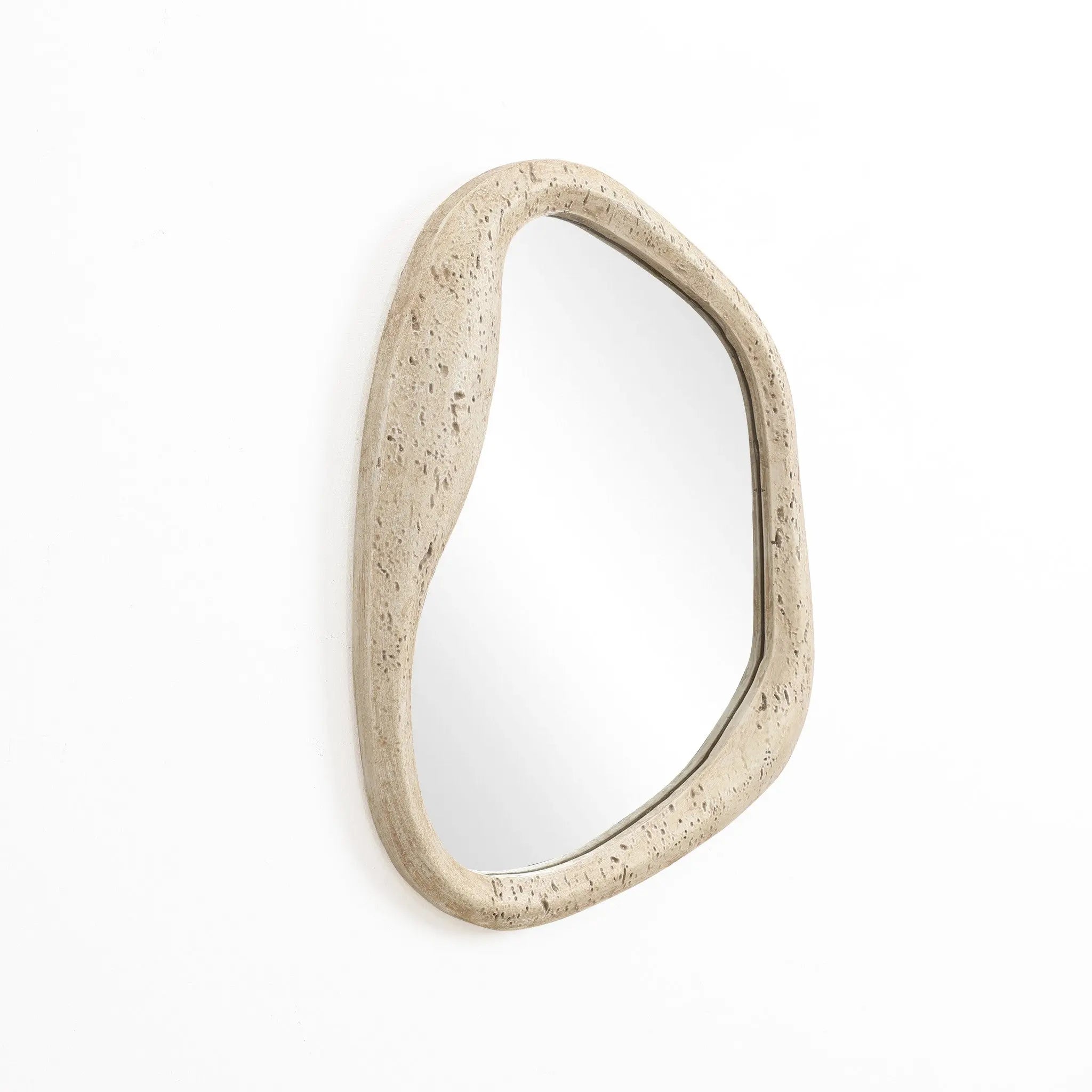 Asymmetrical oval wall mirror featuring a textured, free-form frame on a plain white background, perfect for modern home decor.