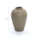 The Rustic brown terracotta urn vase by LuxenHome, standing 14.6 inches tall, brings rustic elegance to refined home decor with its textured rim and olive-green hue against a simple background.
