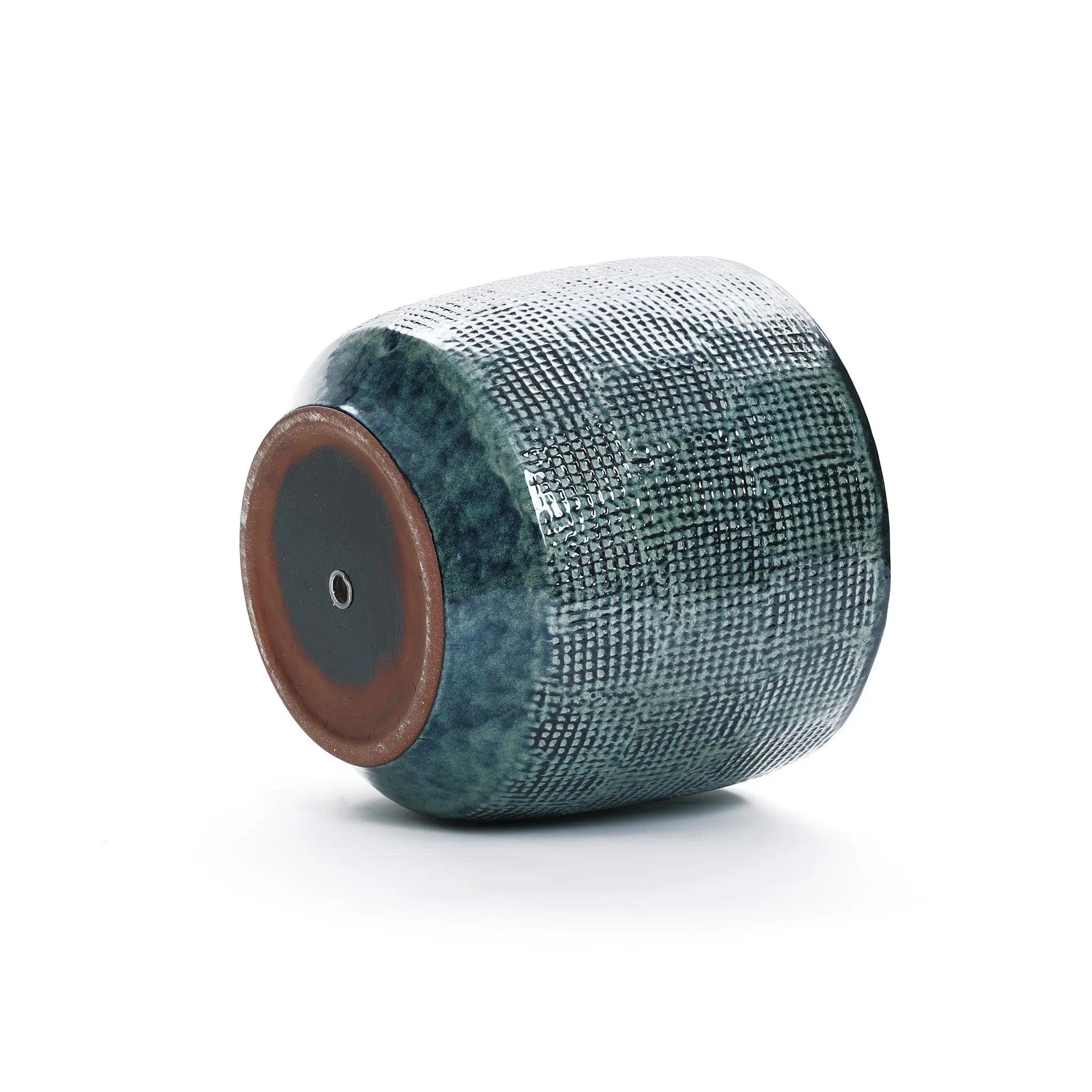A Marina gray glazed round ceramic planter by LuxenHome, measuring 13.98 high, rests on its side against a white background, highlighting its exceptional craftsmanship.