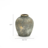 The LuxenHome rustic gold and brown terracotta bud vase, at 8.7 inches high, features vertical grooves and an antique distressed look, making it a perfect addition to any home decor against a plain white background.