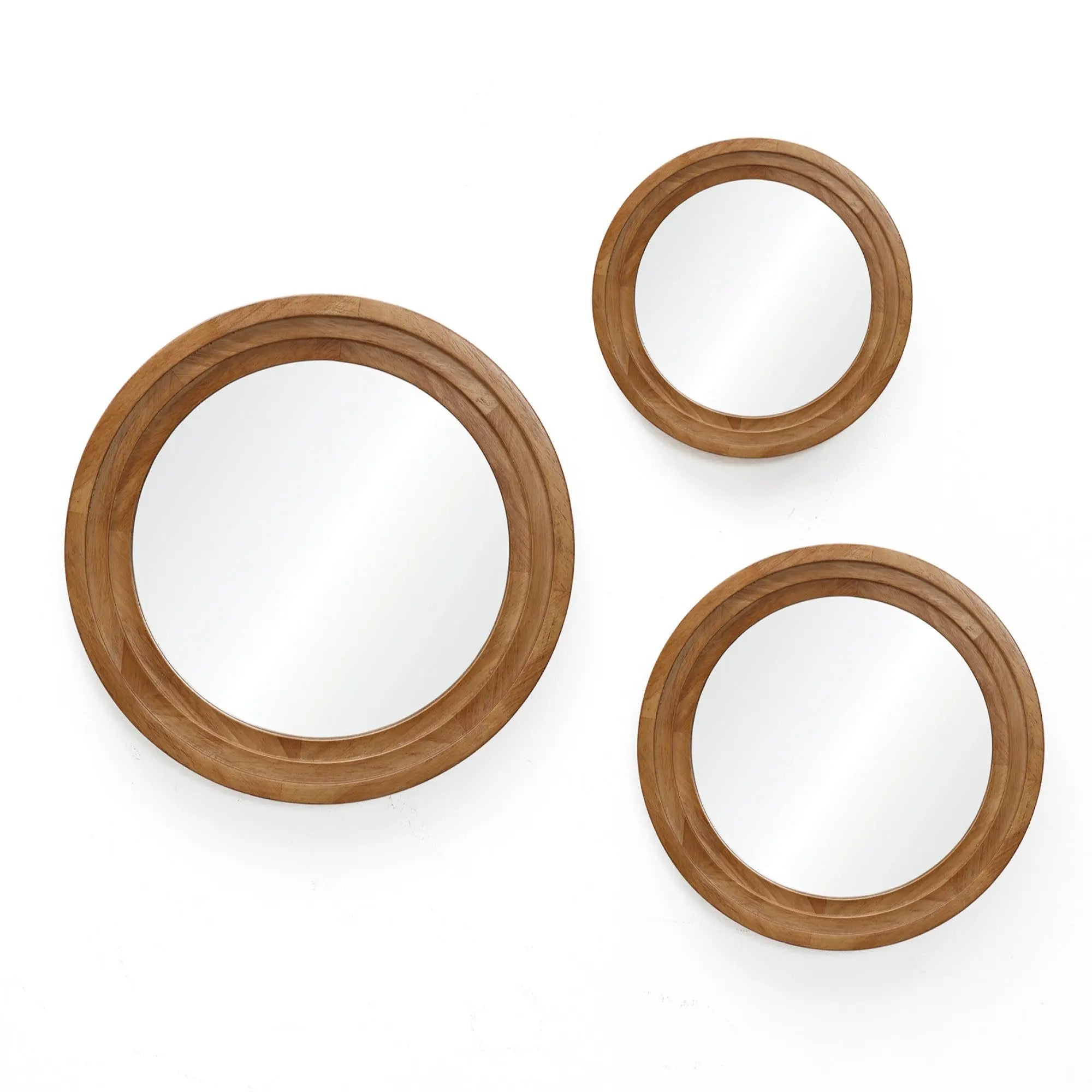 Three round mirrors with rubberwood frames create an optical illusion as they are mounted on a white wall.