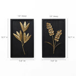 Two black-framed wall art pieces with gold botanical designs: one features leaves, the other vibrant flower bouquets. Perfect for enhancing your interior design, their dimensions and depth are labeled for convenience.