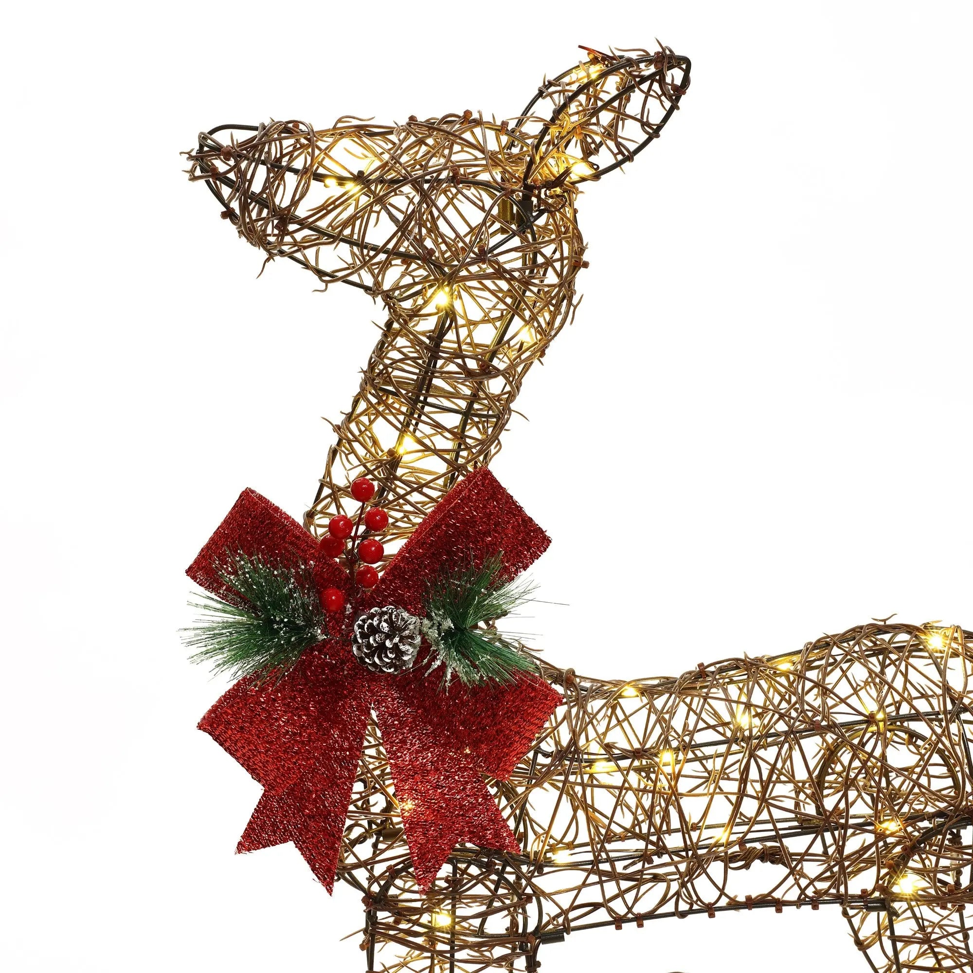Deer-Christmas-Decor-with-red-bow-pinecone-and-red-berries