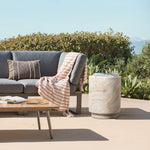 Travertine-Style Round Textured MgO Side Table - LuxenHome