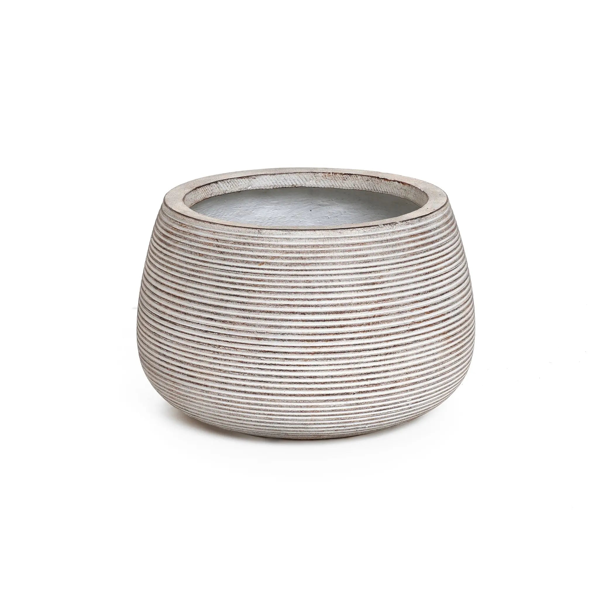 A sleek, round ceramic planter with a ribbed pattern and open top, featuring a minimalist design in light gray.