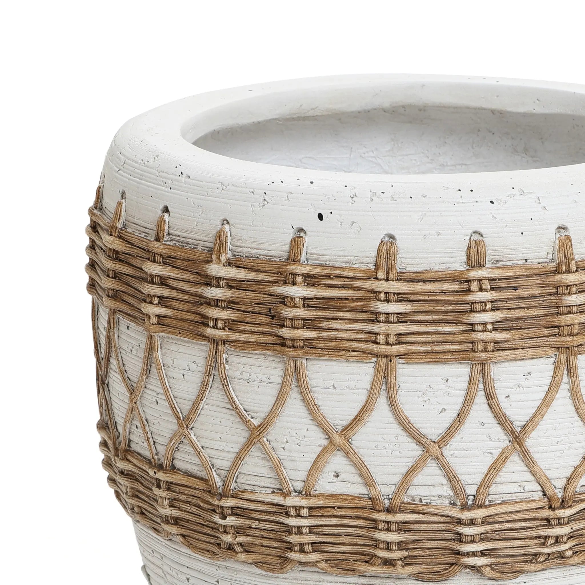 White textured planter with woven wicker accents in a crisscross pattern, exuding a Bohemian style charm.