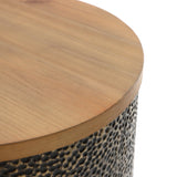 A close-up of a round wooden tabletop with a textured hammered iron base enriches the design.