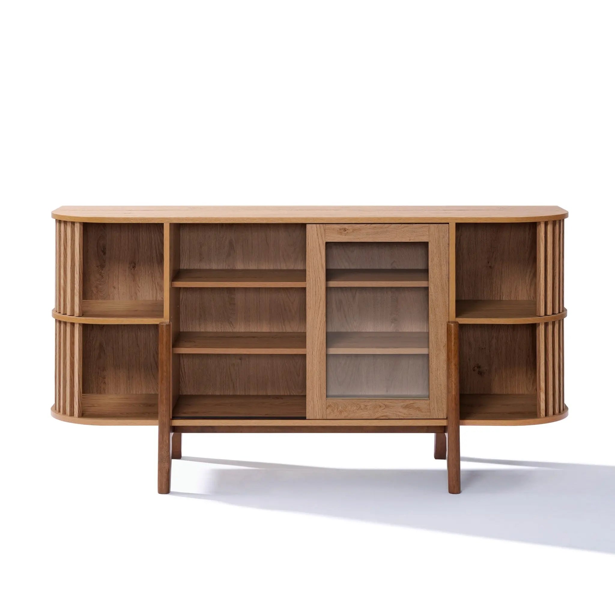 The Miko sideboard server cabinet by LuxenHome features an oak mid-century modernist design with open shelves and a glass sliding door on the right. Its smooth, rounded edges and minimalist style create an elegant shadow on the white surface below.