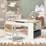 Activity Children Table with Storage Bookcase and 2 Chairs Set featuring white and natural wood finish, adjustable height tabletop, built-in storage compartments, paper roll holder, and art supply holders in a playfully decorated room with pastel walls and animal-themed decor.