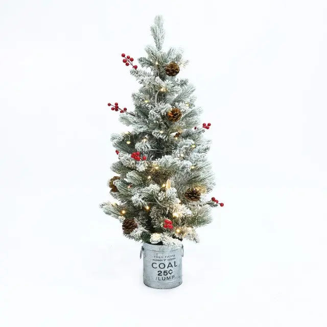 snow-flocked-potted-christmas-tree-with-cherry-and-pine-cone