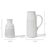The ceramic vases evoke rustic charm with their textured finishes, reminiscent of vintage design. One resembles a milk jug table vase at 8.07 high and 4.84 wide, while the taller piece features a handle, standing at 11.81 high and 7.48 wide.