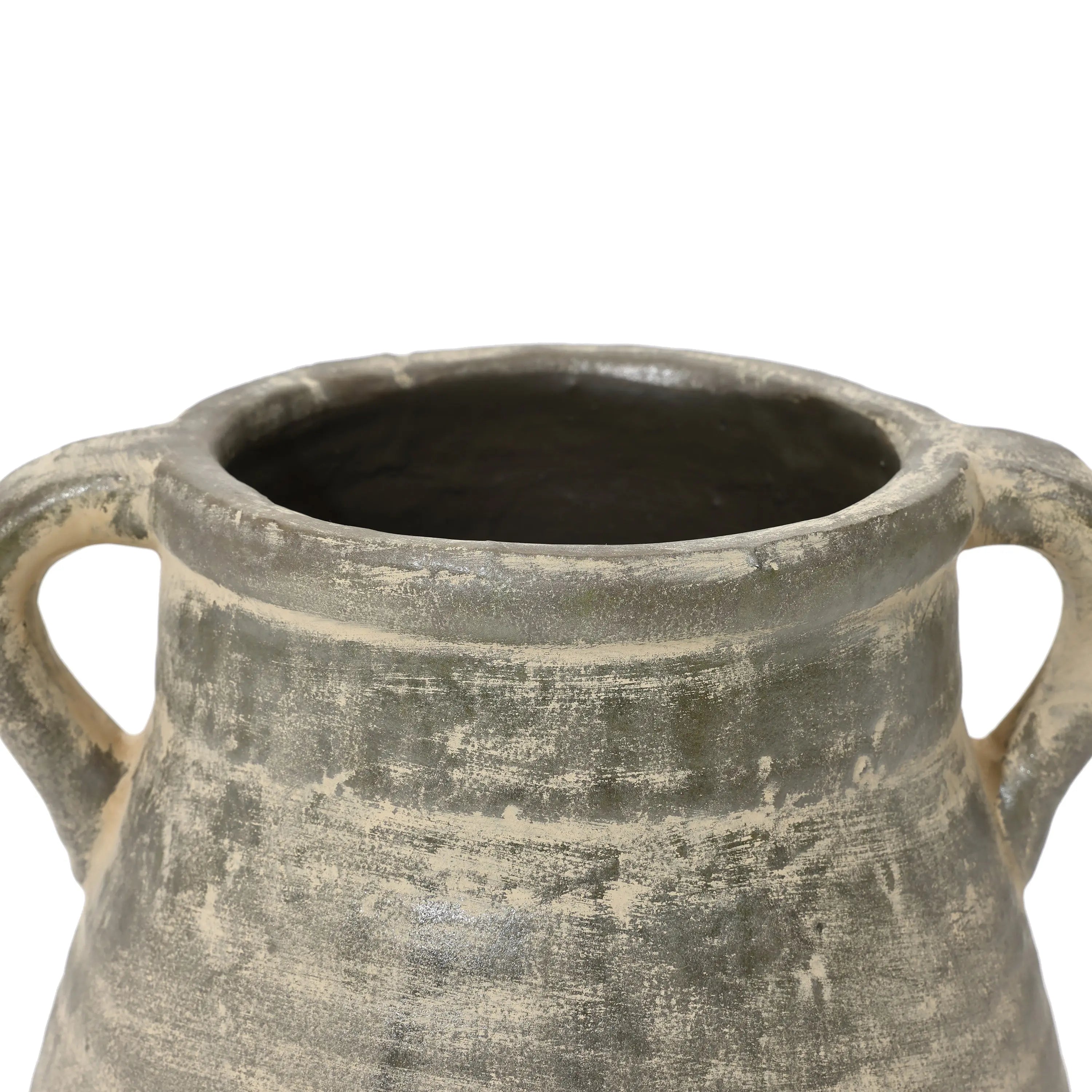 This handcrafted gray ceramic jug, featuring two handles and a weathered finish, exudes historic depth reminiscent of ancient terracotta vases.