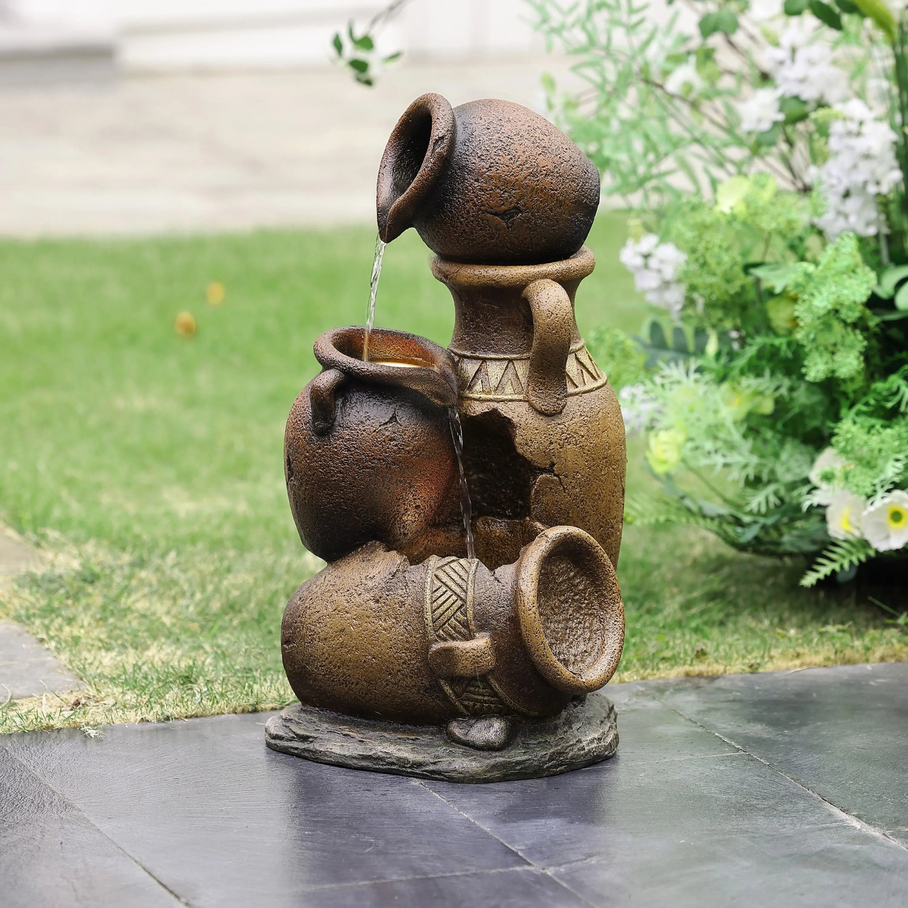 brown-urn-water-fountain-in-the-garden