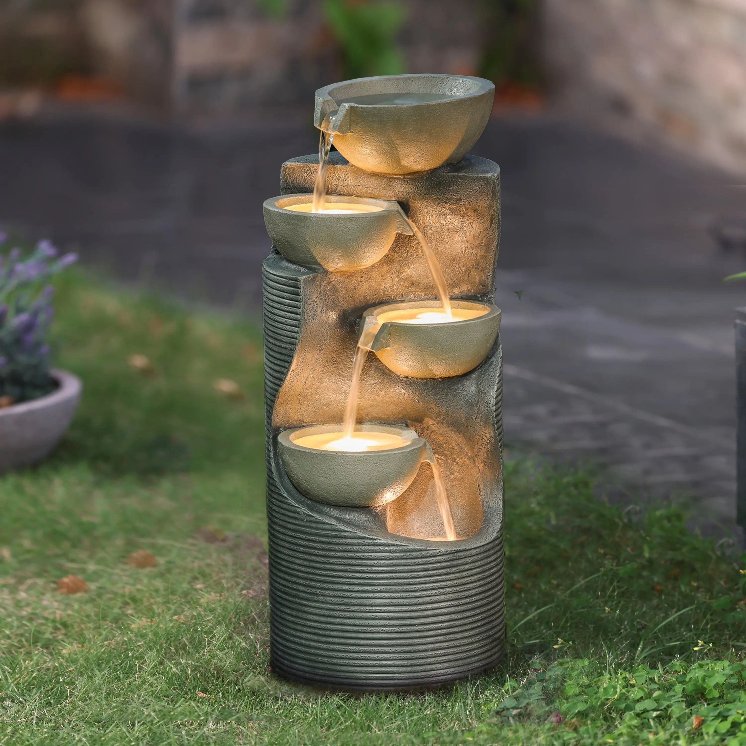 modern style cascading outdoor water fountain in the backyard