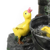 baby-ducks-bathing-at-a-farmhouse-style-water-pump-outdoor-resin-fountain