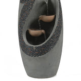 A modern patio fountain with a gray stone finish features a cascading curved structure of two brown bowls, one above the other, channeling water from top to bottom. Crafted from weather-resistant materials for lasting outdoor elegance.