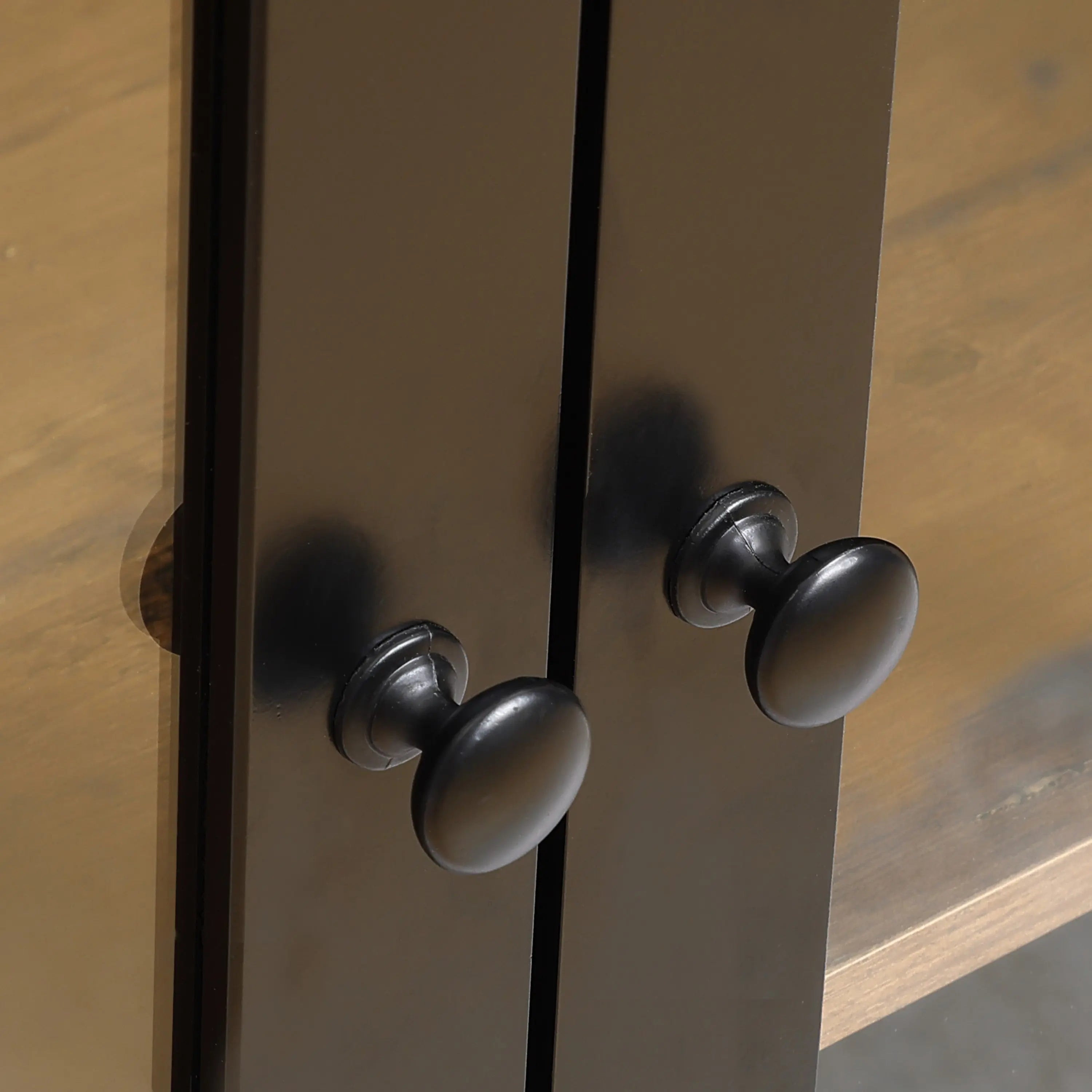 black-handles-on-cabinet-with-two-doors