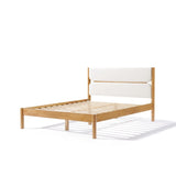 A solid wood bed frame exudes modern sophistication, featuring a cushioned headboard in luxurious white boucle fabric and a slatted base, beautifully set against a plain white background.