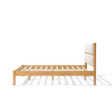 Solid wood bed with a light, luxurious white boucle fabric-upholstered headboard, shown from the side against a white background, exudes modern sophistication.