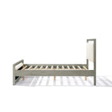 A side view of a modern bedroom piece featuring a gray bed frame with a wooden structure and an upholstered headboard. The bed frame has slatted wood supports and a minimalist design, complementing the white boucle headboard effortlessly.