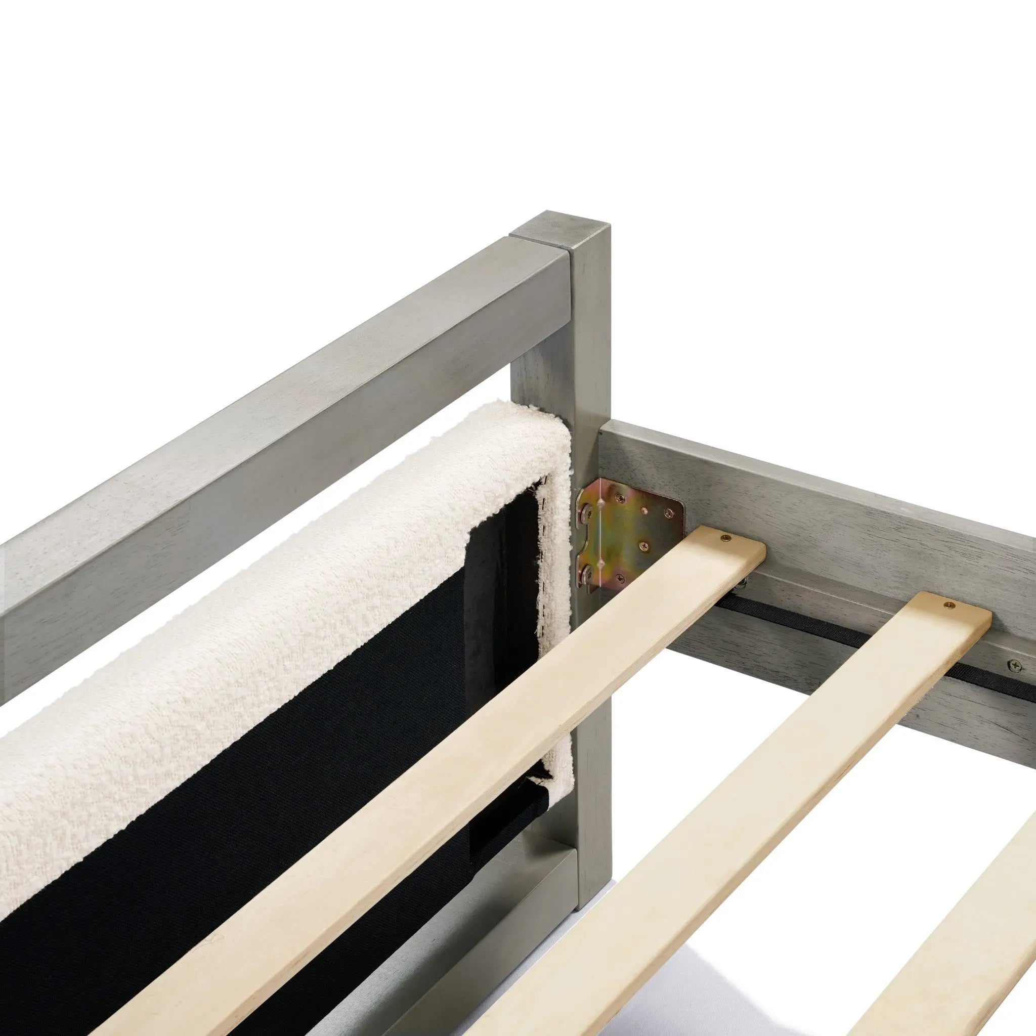 Close-up of a partially assembled gray bed frame with two slats and a metal bracket. A padded section is attached to one side, complementing the sleek design. Perfect for a modern bedroom aesthetic.