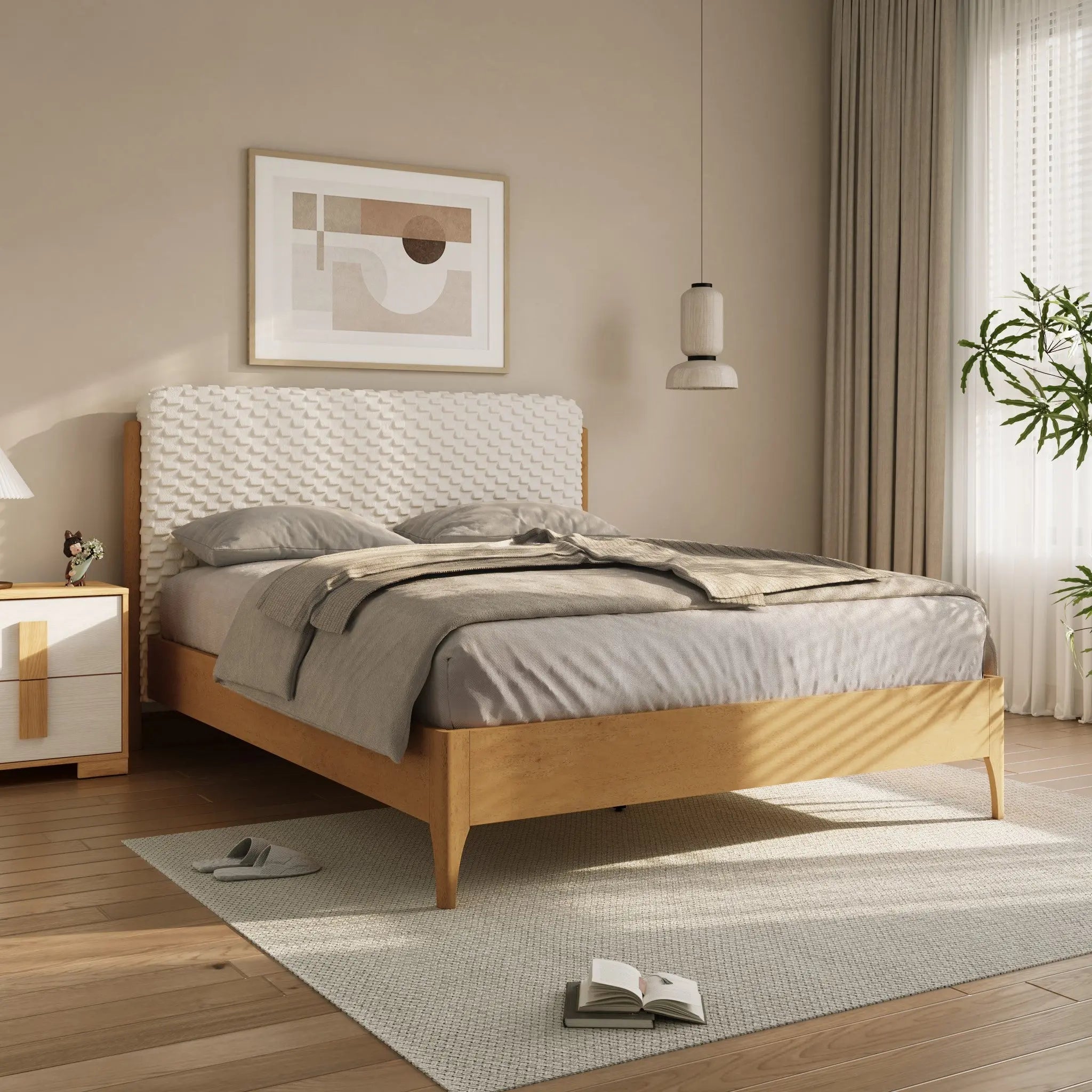 A contemporary bedroom features a Rubberwood Platform Bed adorned with gray bedding and a textured, upholstered headboard. A pendant light hangs above the nightstand, casting a warm glow. A plant breathes life into the corner, while an abstract art piece adds visual dimension to the space.