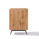 A freestanding cabinet with a walnut oak finish and black metal legs, viewed from the front, captures the essence of mid-century modernism.